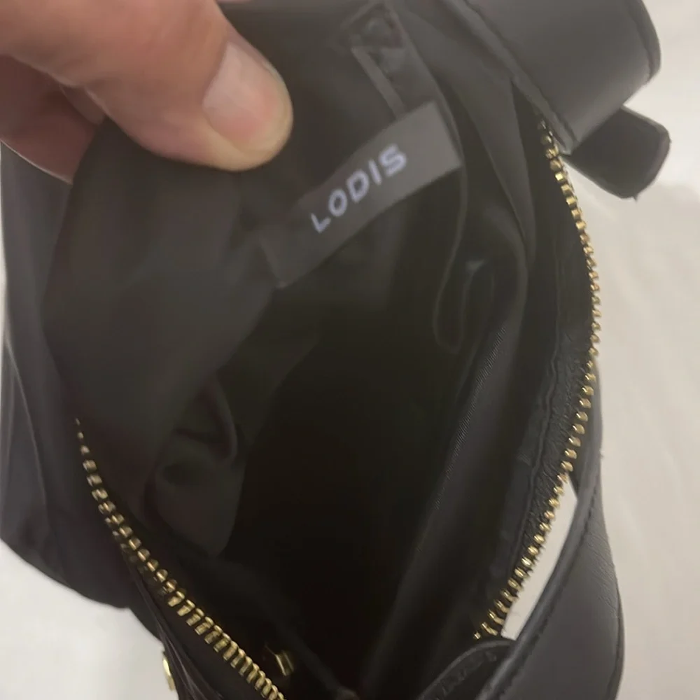 Lodis NWOT Crossbody Bag with Bee Charm adjustable straps Gold & Black